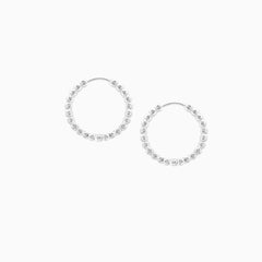 Huggie hoops oorbellen dots 17mm zilver