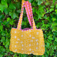 Tas bloemen, geel/roze
